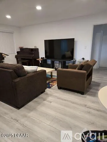 a living room with furniture and a couch