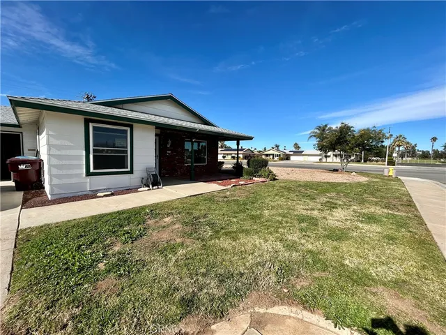 a house view with a garden space