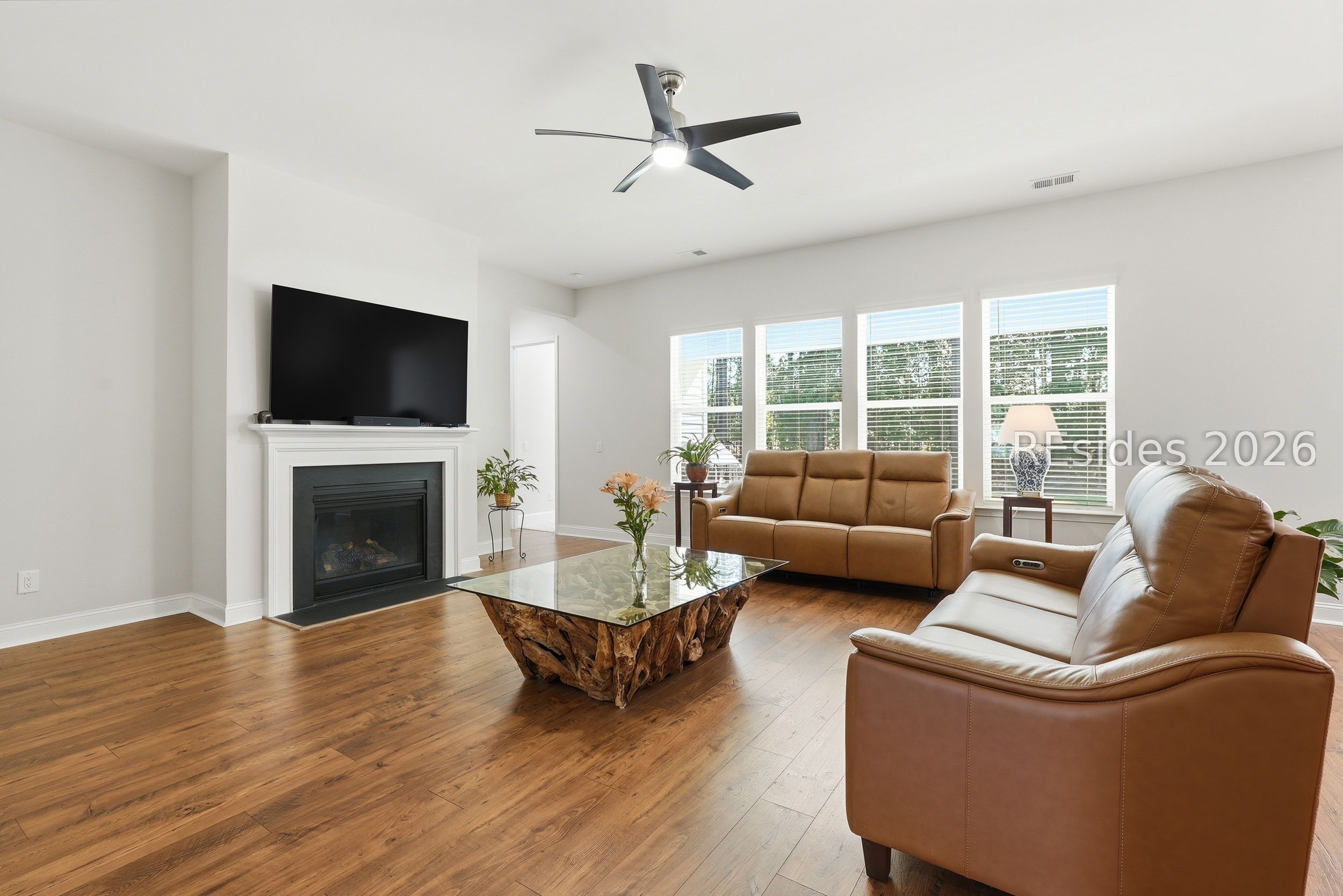 465 Azalea Place Hardeeville, SC 29927 - Photo 19 of 55 Wall of windows allows for abundant natural light.