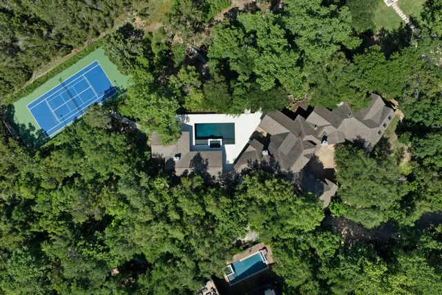 an aerial view of house with yard