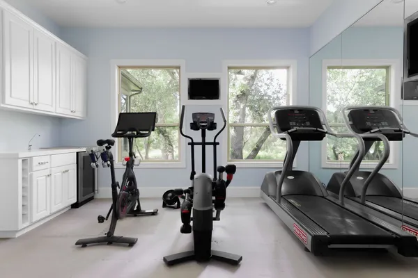 a view of a room with gym equipment