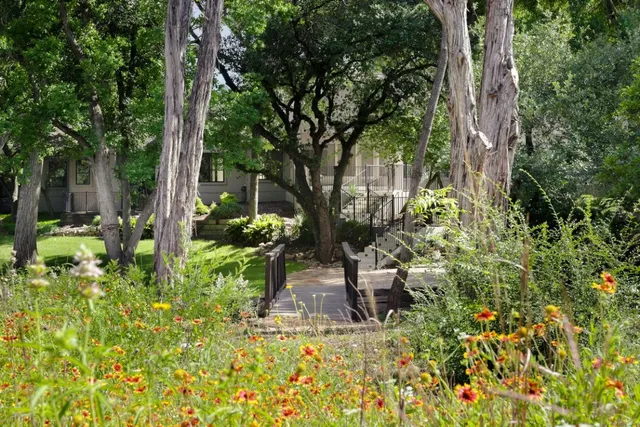 a view of backyard with sitting area