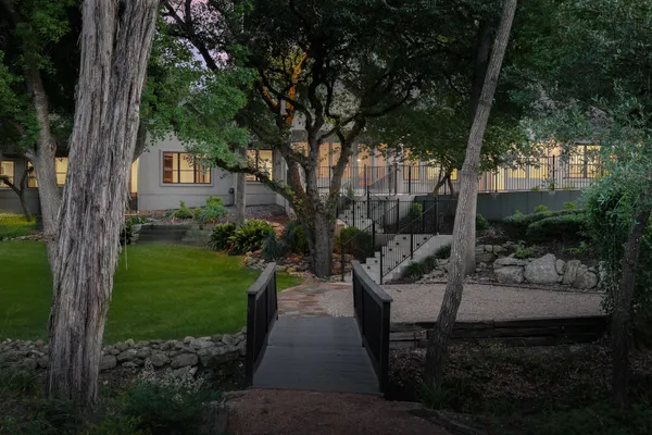 a view of green field with sitting area