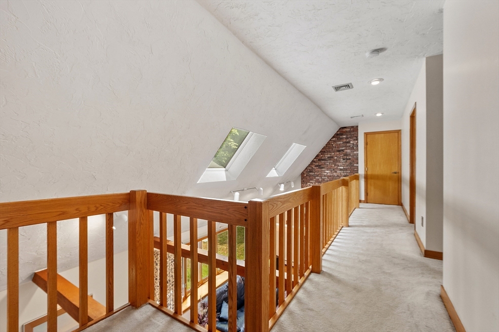 624 Old Harvard Road Boxborough, MA 01719 - Photo 19 of 42 a view of a hallway with staircase