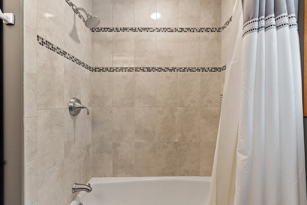 624 Old Harvard Road Boxborough, MA 01719 - Photo 24 of 42 a bathroom with a shower