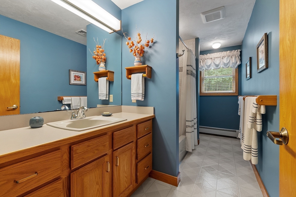 624 Old Harvard Road Boxborough, MA 01719 - Photo 32 of 42 a bathroom with a sink double vanity