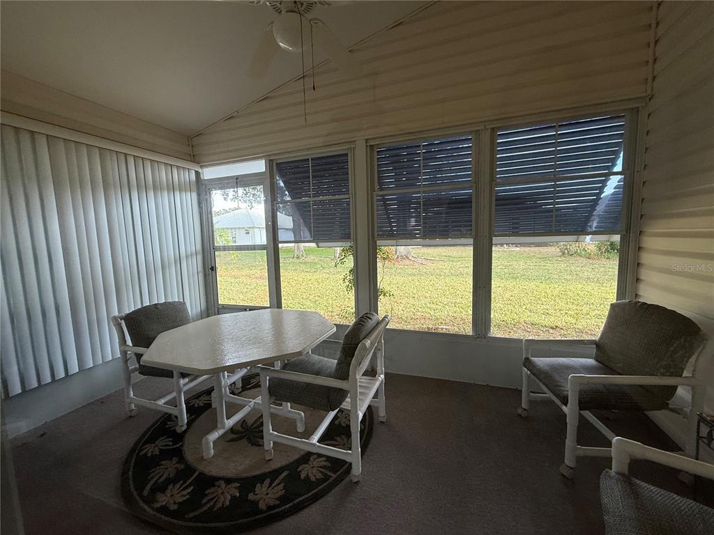 5510 Shriver Street Leesburg, FL 34748 - Photo 14 of 16 a dining room with furniture window and outside view