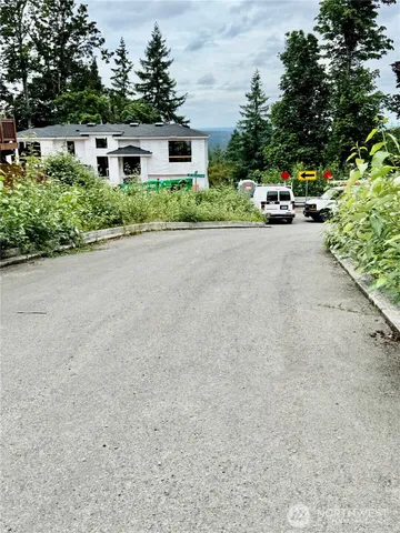 a view of a backyard of a house