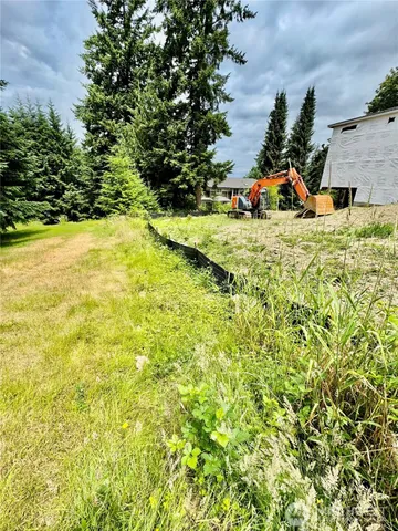 a picture of a white building with glass window