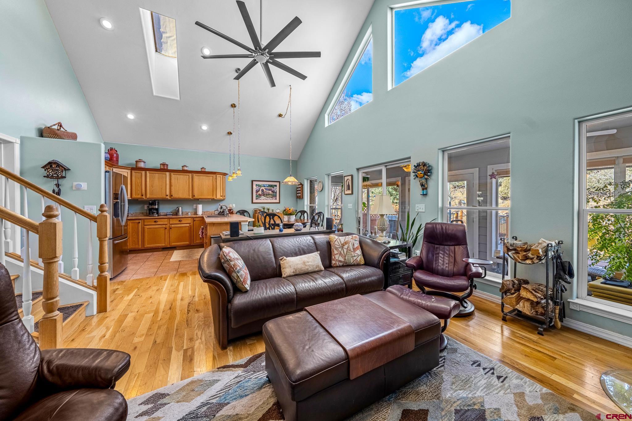 221 Jenkins Ranch Road, Unit L Durango, CO 81301 - Photo 4 of 34 a living room with furniture or couch and a ceiling fan