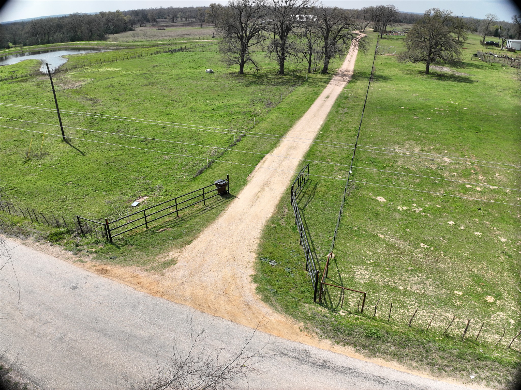 346 Rd Milano Tx 76556 Road Milano, TX 76556 - Photo 5 of 6 a view of a garden with a lake