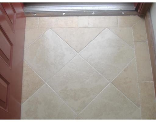 35 Wing Street Springfield, MA 01151 - Photo 5 of 10 a bathroom with a shower and a window
