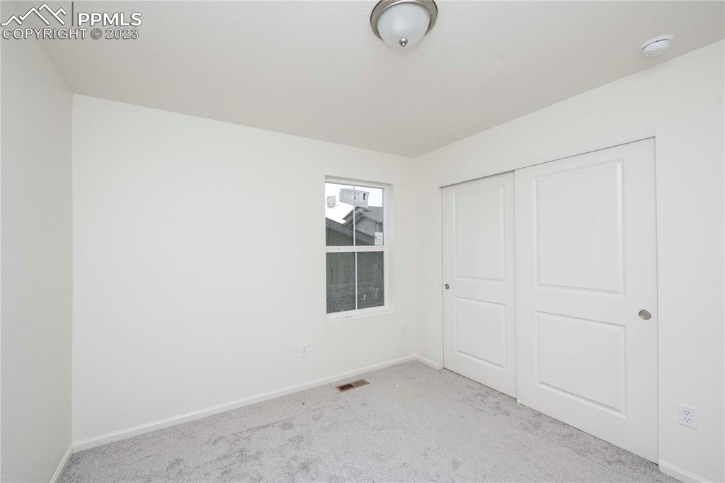 644 Felicity Loop Castle Rock, CO 80109 - Photo 20 of 23 an empty room with windows