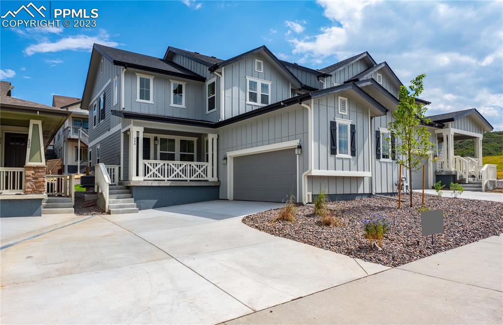 644 Felicity Loop Castle Rock, CO 80109 - Photo 2 of 23 a front view of a house with yard