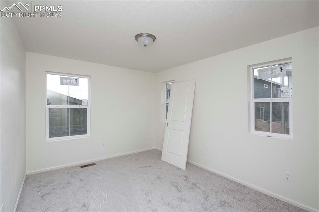 644 Felicity Loop Castle Rock, CO 80109 - Photo 21 of 23 an empty room with windows