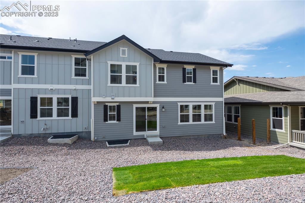 644 Felicity Loop Castle Rock, CO 80109 - Photo 23 of 23 a front view of a house with a yard and porch