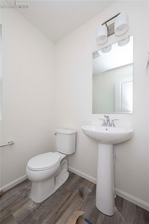 644 Felicity Loop Castle Rock, CO 80109 - Photo 10 of 23 a bathroom with a sink toilet and a mirror