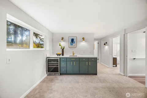 a view of kitchen with furniture and cabinet