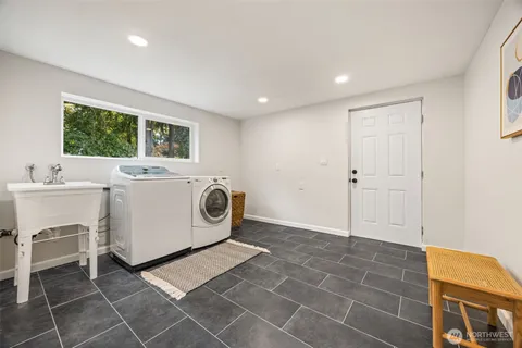 a utility room with washer and dryer