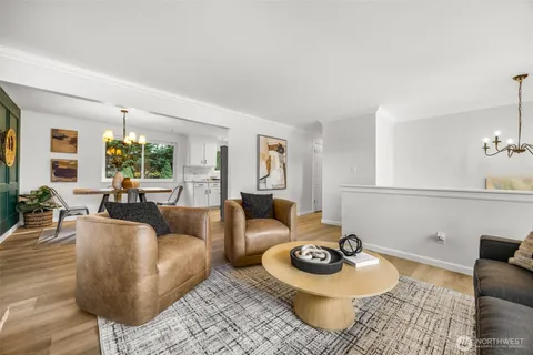 a living room with furniture and a rug