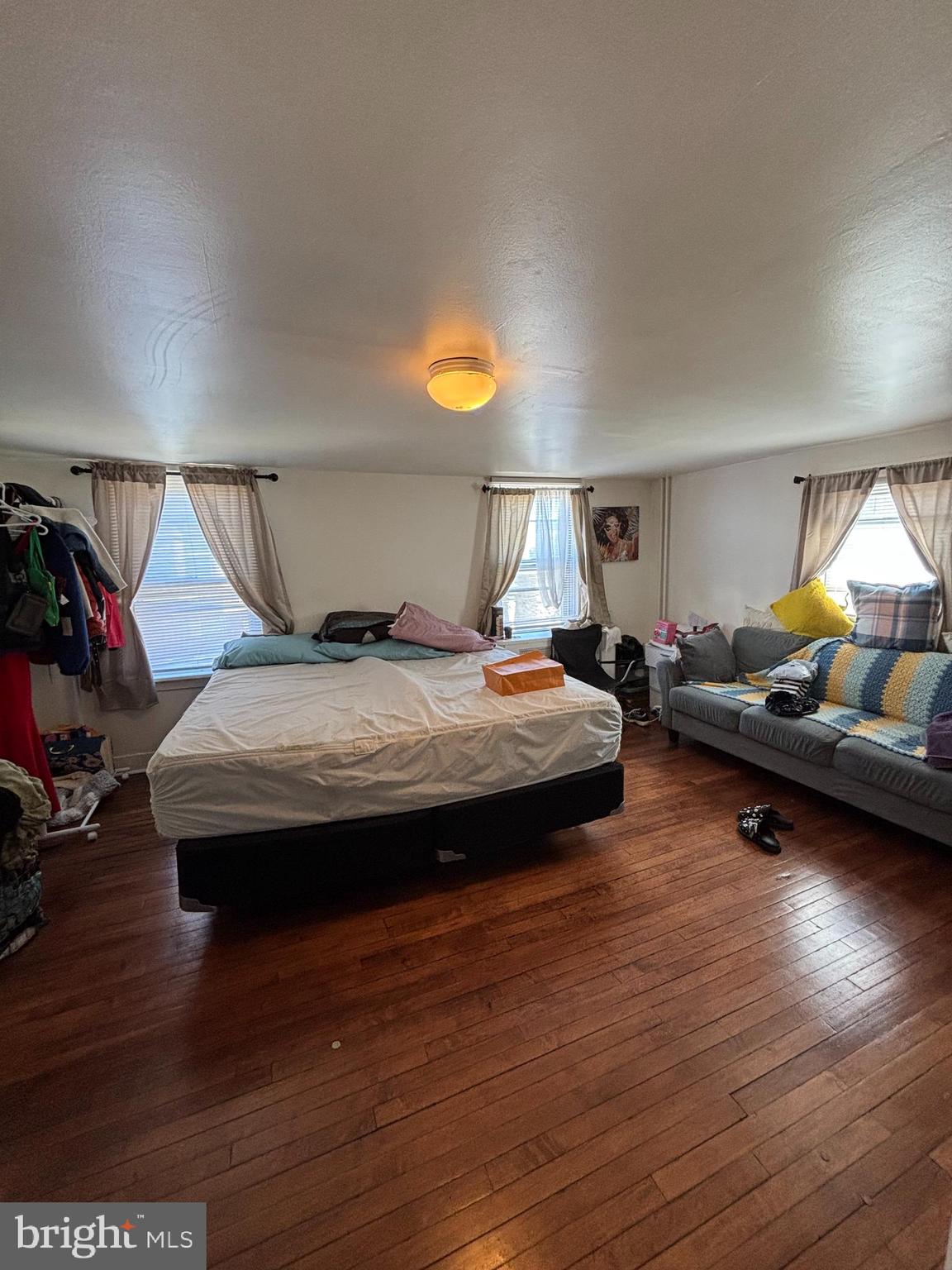 4448 Mitchell Street Philadelphia, PA 19128 - Photo 14 of 22 a bedroom with bed and window