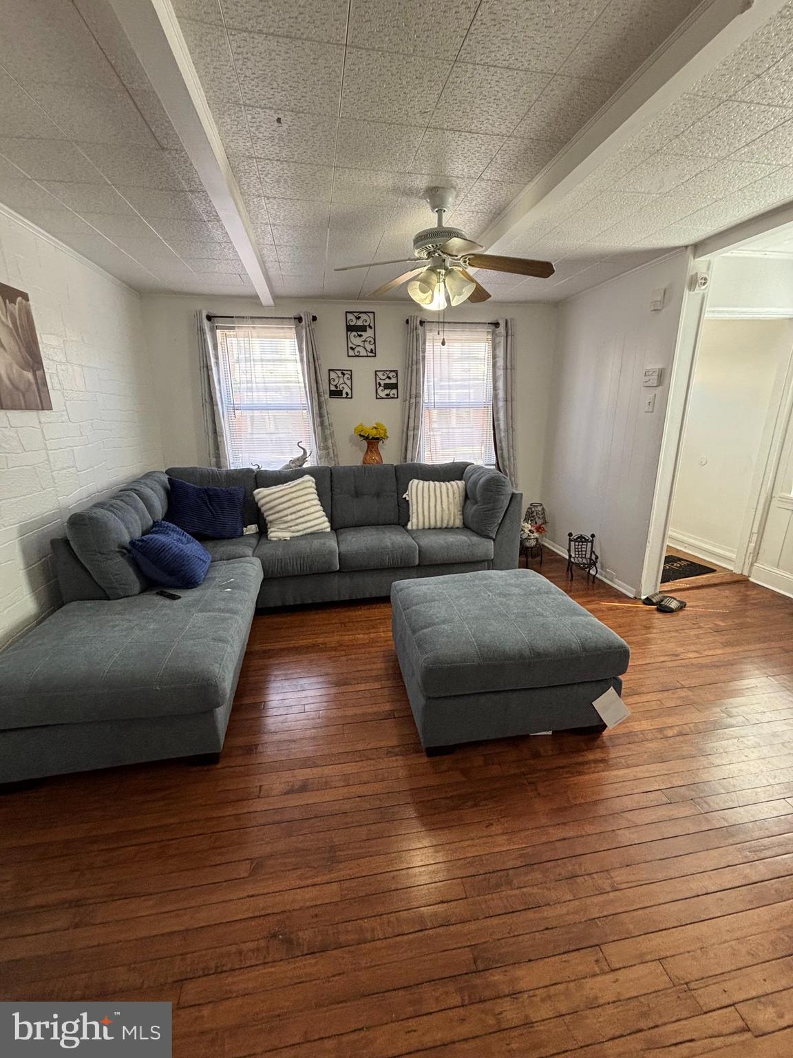 4448 Mitchell Street Philadelphia, PA 19128 - Photo 9 of 22 a living room with furniture and a wooden floor