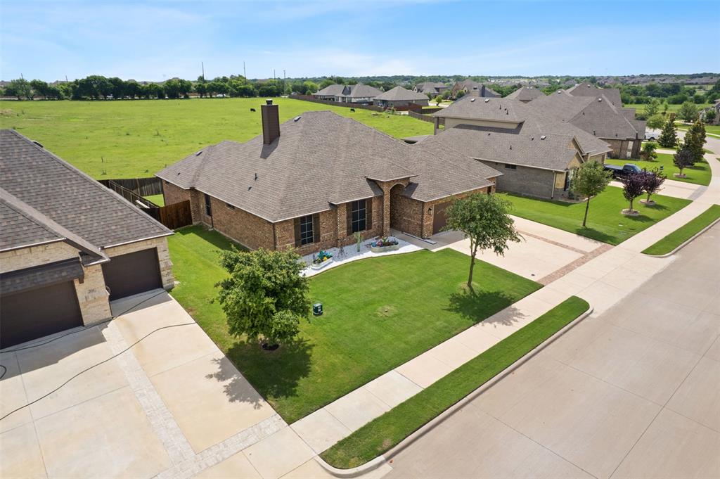 2618 Byrd Ranch Road Midlothian, TX 76065 - Photo 36 of 38 an aerial view of a house with outdoor space and lake view