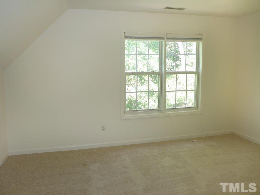 400 B W Poplar Avenue Carrboro, NC 27510 - Photo 13 of 20 an empty room with a window