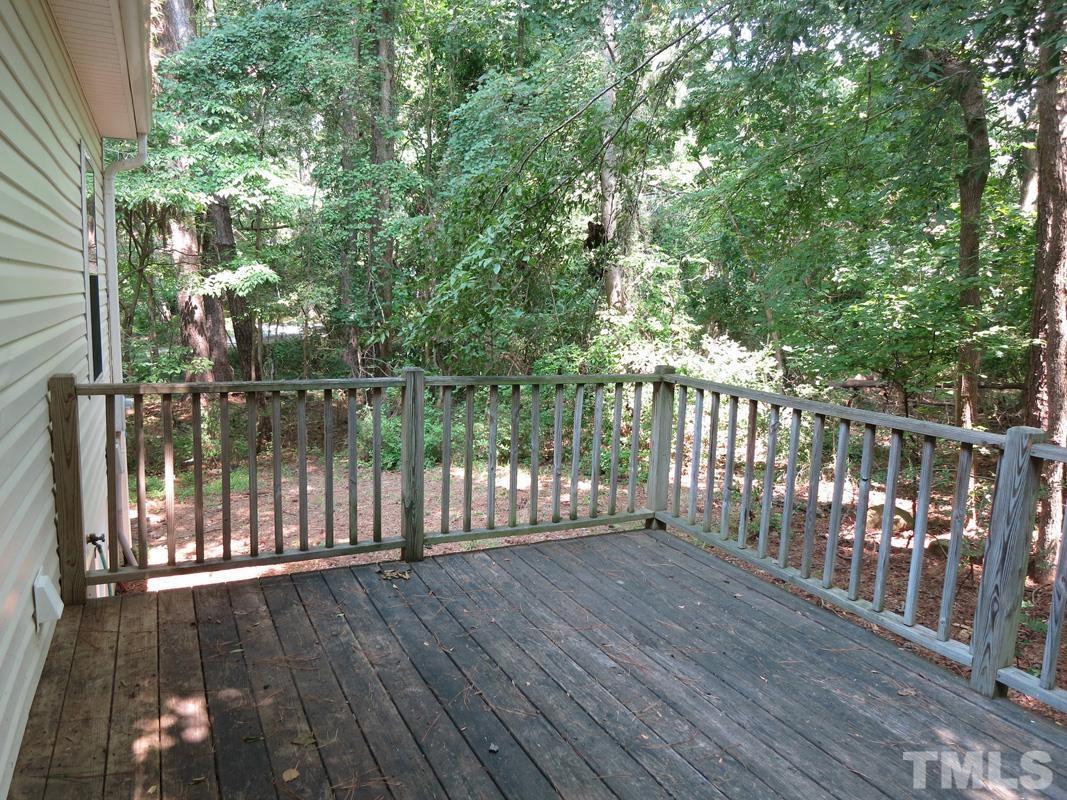 400 B W Poplar Avenue Carrboro, NC 27510 - Photo 16 of 20 a view of deck with wooden floor and fence