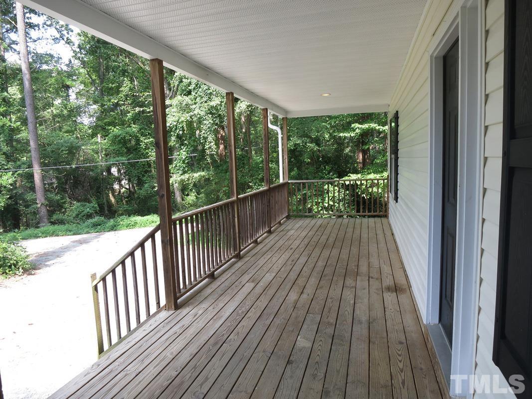 400 B W Poplar Avenue Carrboro, NC 27510 - Photo 2 of 20 a view of balcony with wooden floor