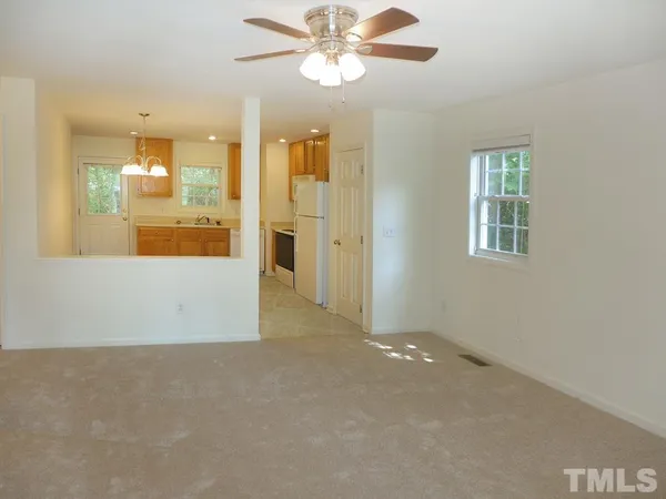an empty room with a bathroom