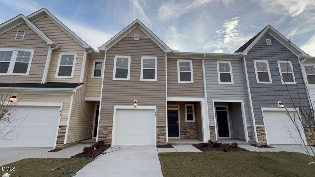 229 Lily Patch Lane Smithfield, NC 27577 - Photo 1 of 23 a front view of a house with a yard
