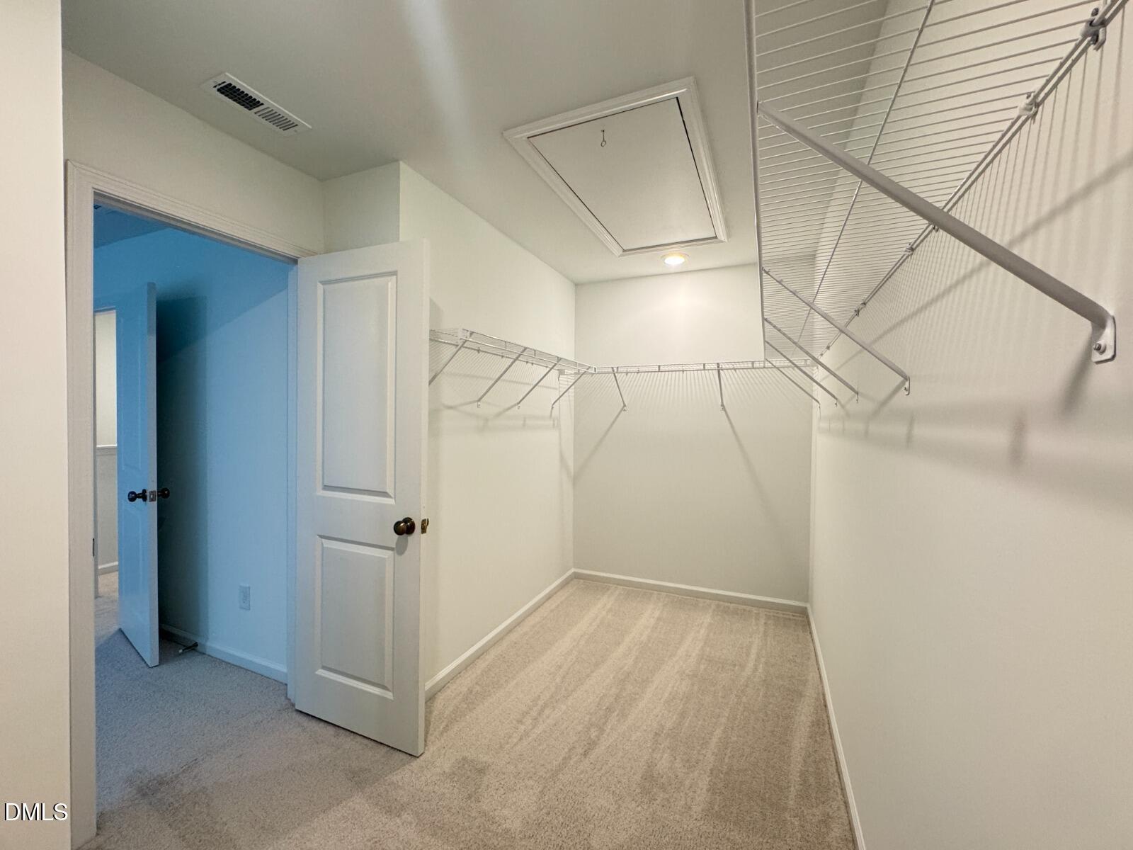 229 Lily Patch Lane Smithfield, NC 27577 - Photo 11 of 23 a view of a room with racks on the wall