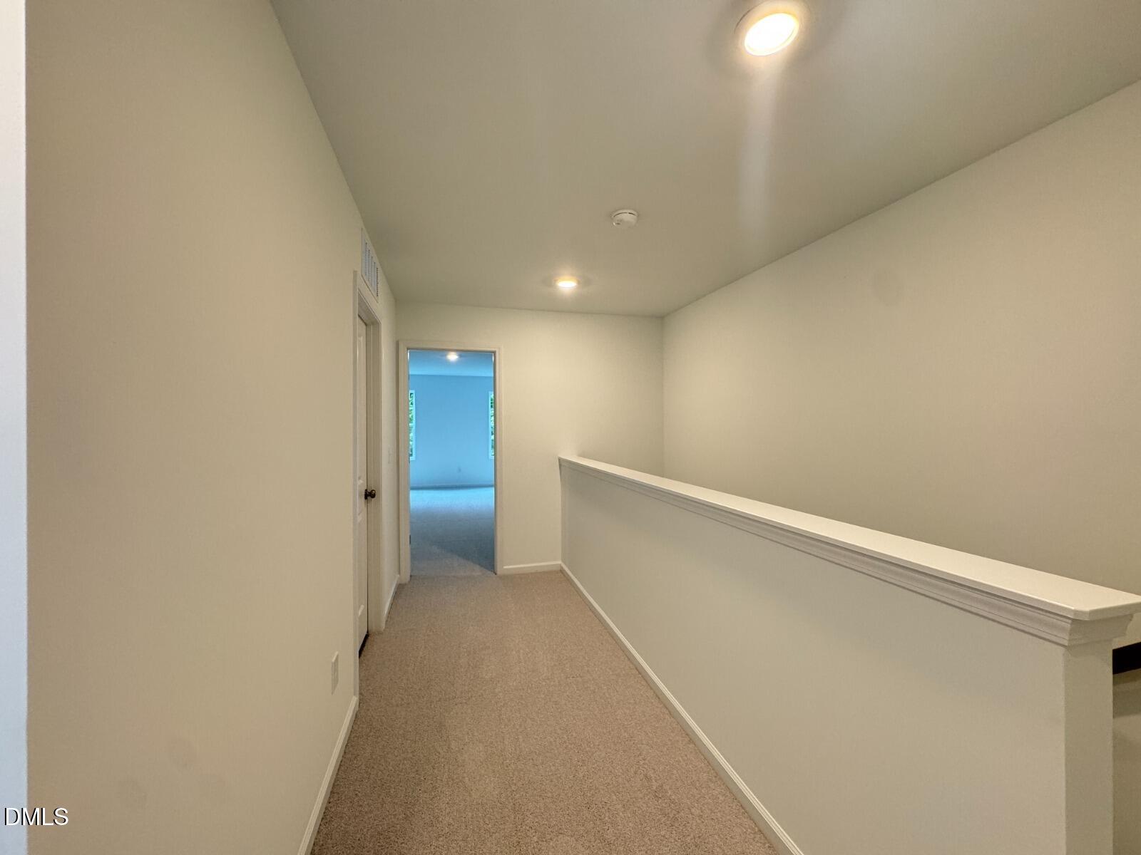 229 Lily Patch Lane Smithfield, NC 27577 - Photo 7 of 23 a view of an empty room