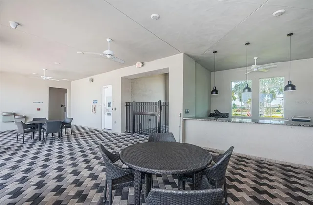 a front view of a house with a yard and a garage