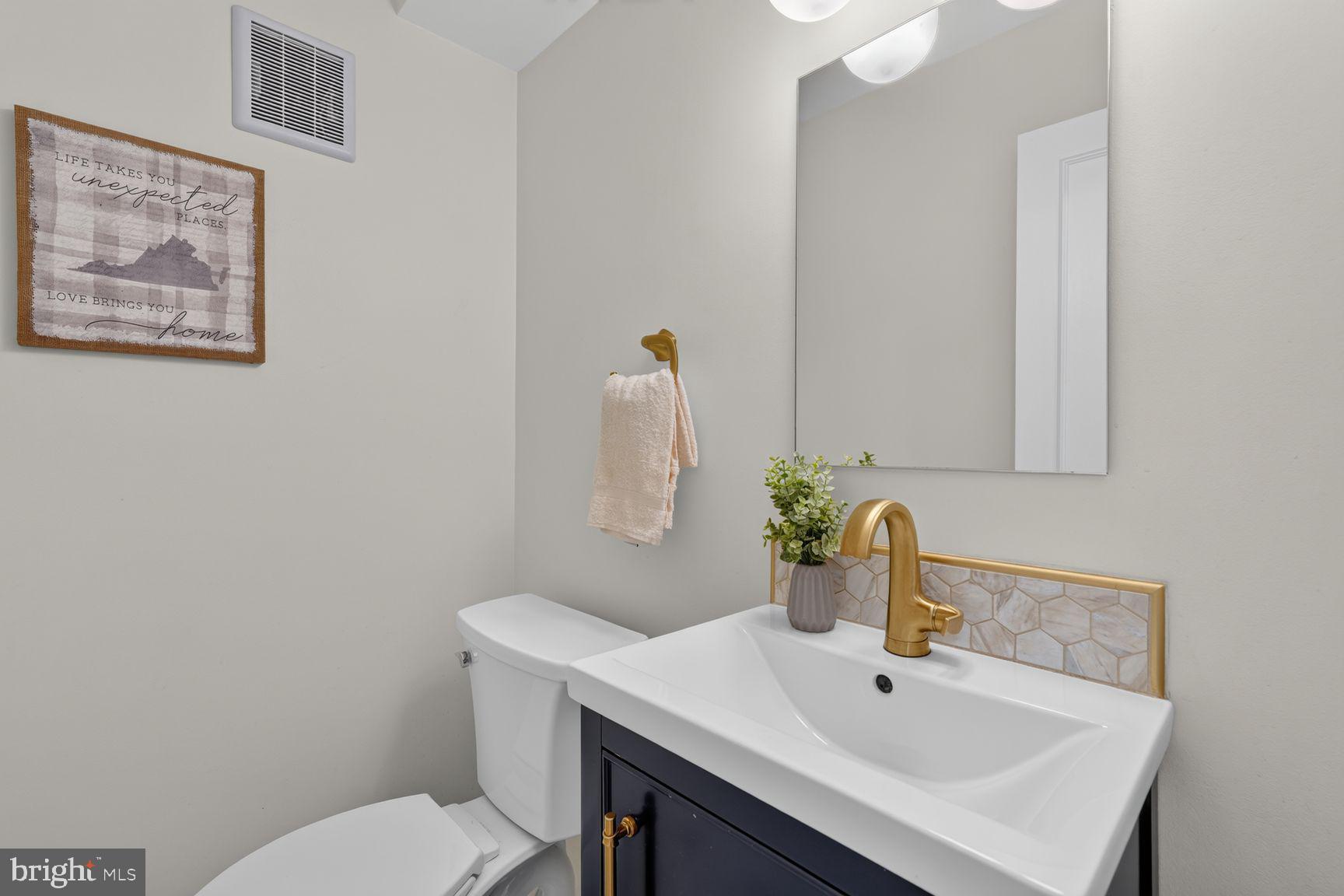 8312 Wickham Road Springfield, VA 22152 - Photo 23 of 49 Updated main level powder room