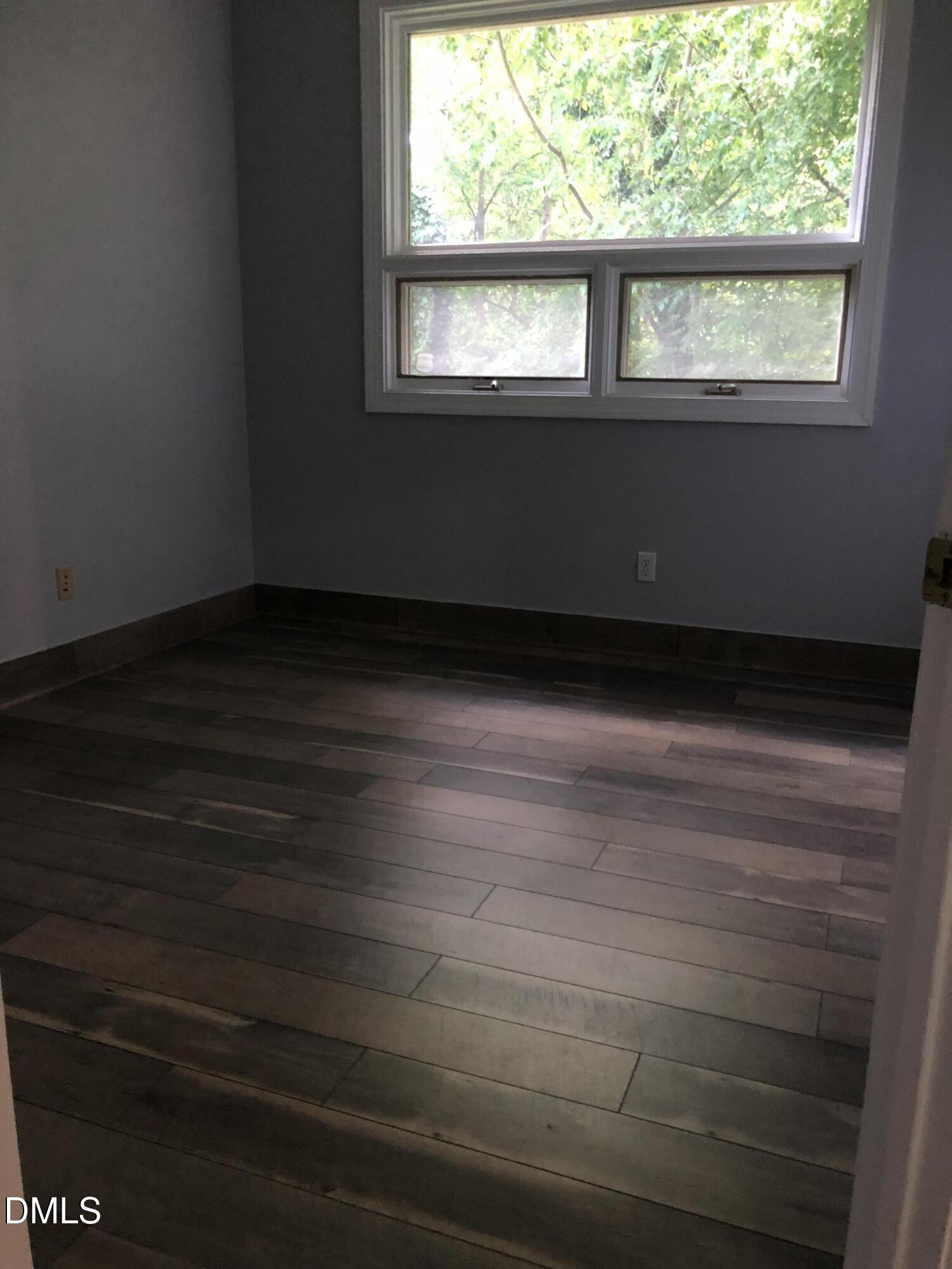 4424 Louisburg Road Raleigh, NC 27616 - Photo 13 of 17 a view of empty room with window