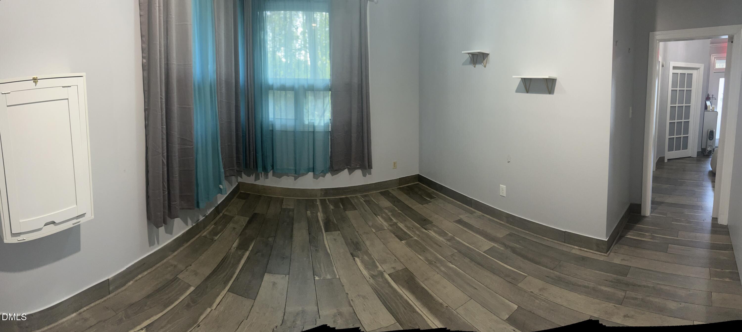 4424 Louisburg Road Raleigh, NC 27616 - Photo 14 of 17 a view of balcony with wooden floor
