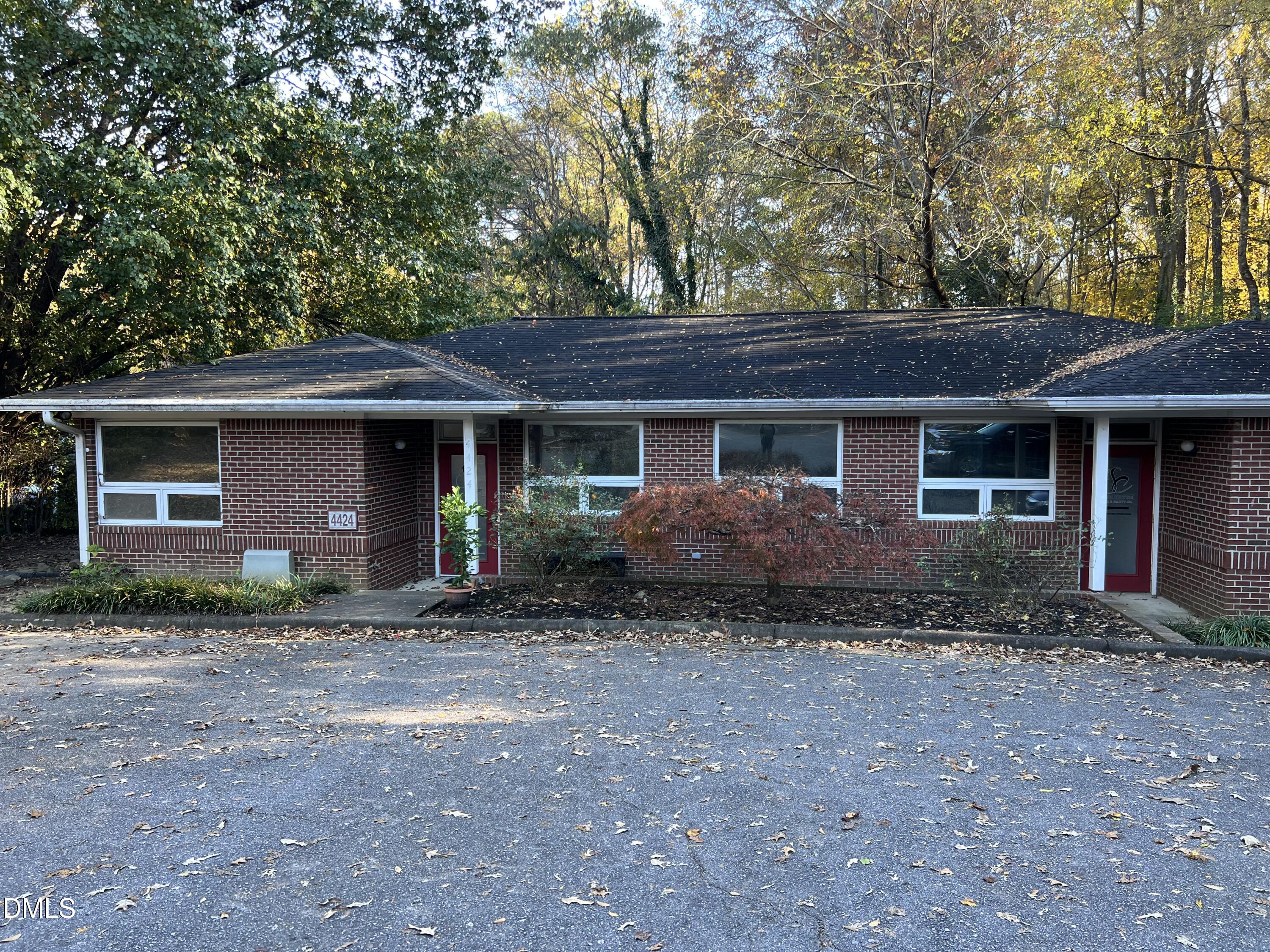 4424 Louisburg Road Raleigh, NC 27616 - Photo 2 of 17 a front view of a house with garden