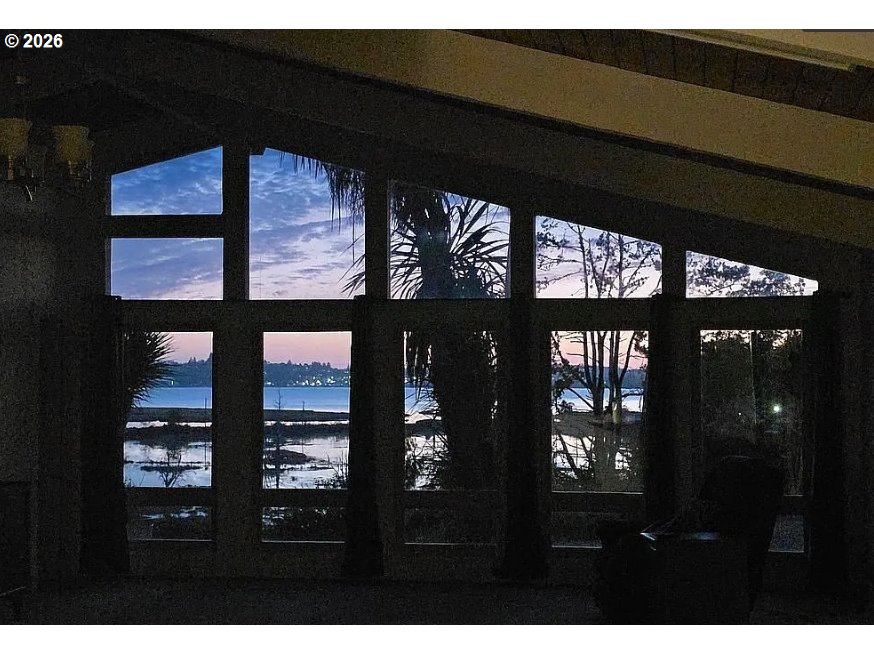 94475 Golf Course Lane North Bend, OR 97459 - Photo 19 of 45 a black and white building with black door