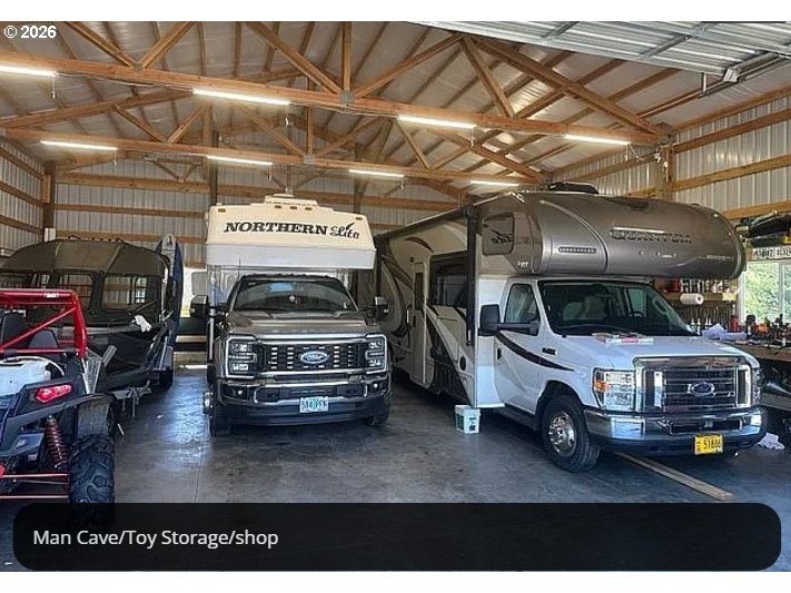 94475 Golf Course Lane North Bend, OR 97459 - Photo 20 of 45 a car parked in garage