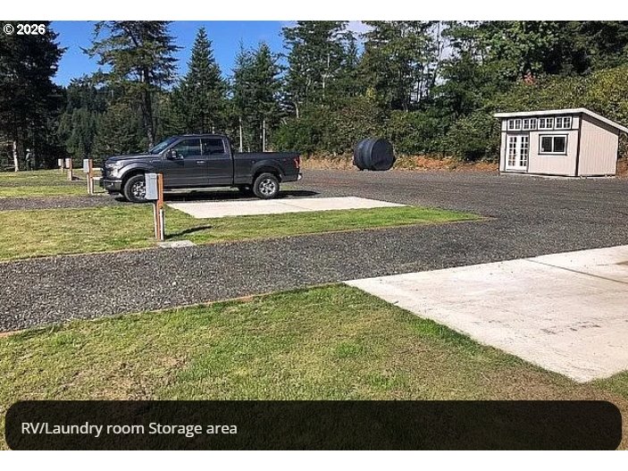 94475 Golf Course Lane North Bend, OR 97459 - Photo 23 of 45 a view of a yard with a house