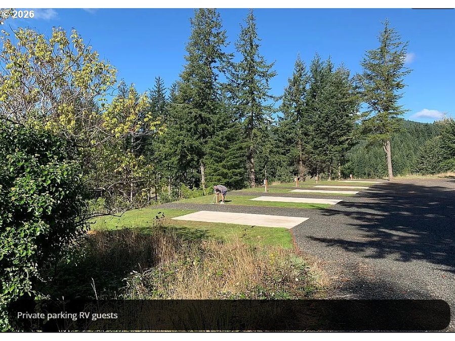 94475 Golf Course Lane North Bend, OR 97459 - Photo 26 of 45 a view of a swimming pool with a yard