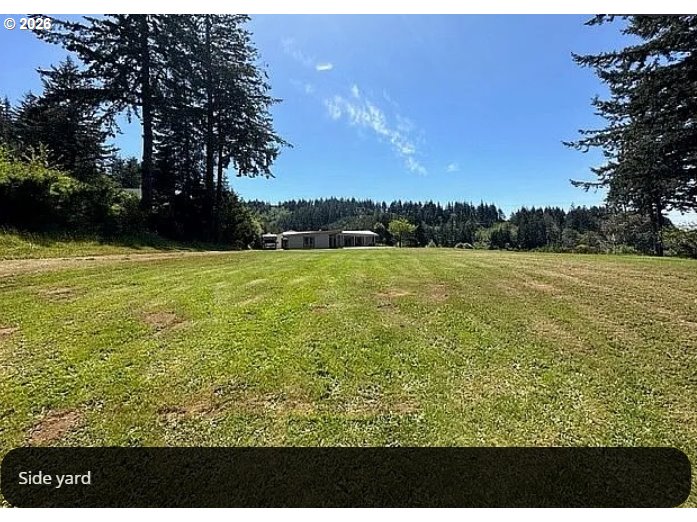 94475 Golf Course Lane North Bend, OR 97459 - Photo 30 of 45 a view of an ocean from a yard