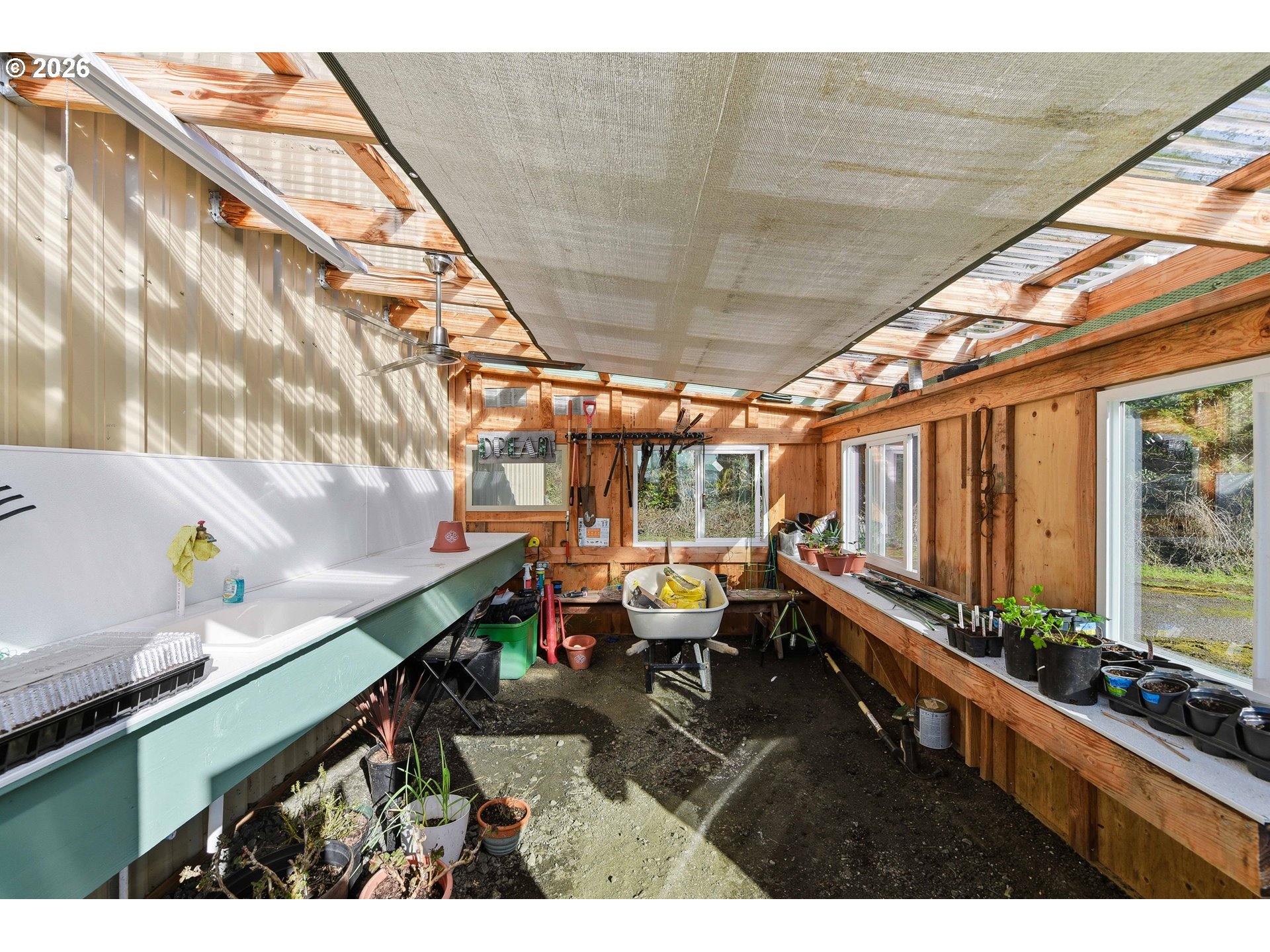 94475 Golf Course Lane North Bend, OR 97459 - Photo 41 of 45 a sitting area with furniture and wooden deck