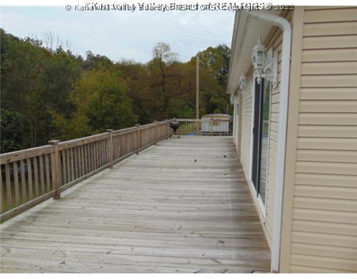 487 Misty River Road Chapmanville, WV 25508 - Photo 5 of 16 Patio/Deck. Warp Around Deck