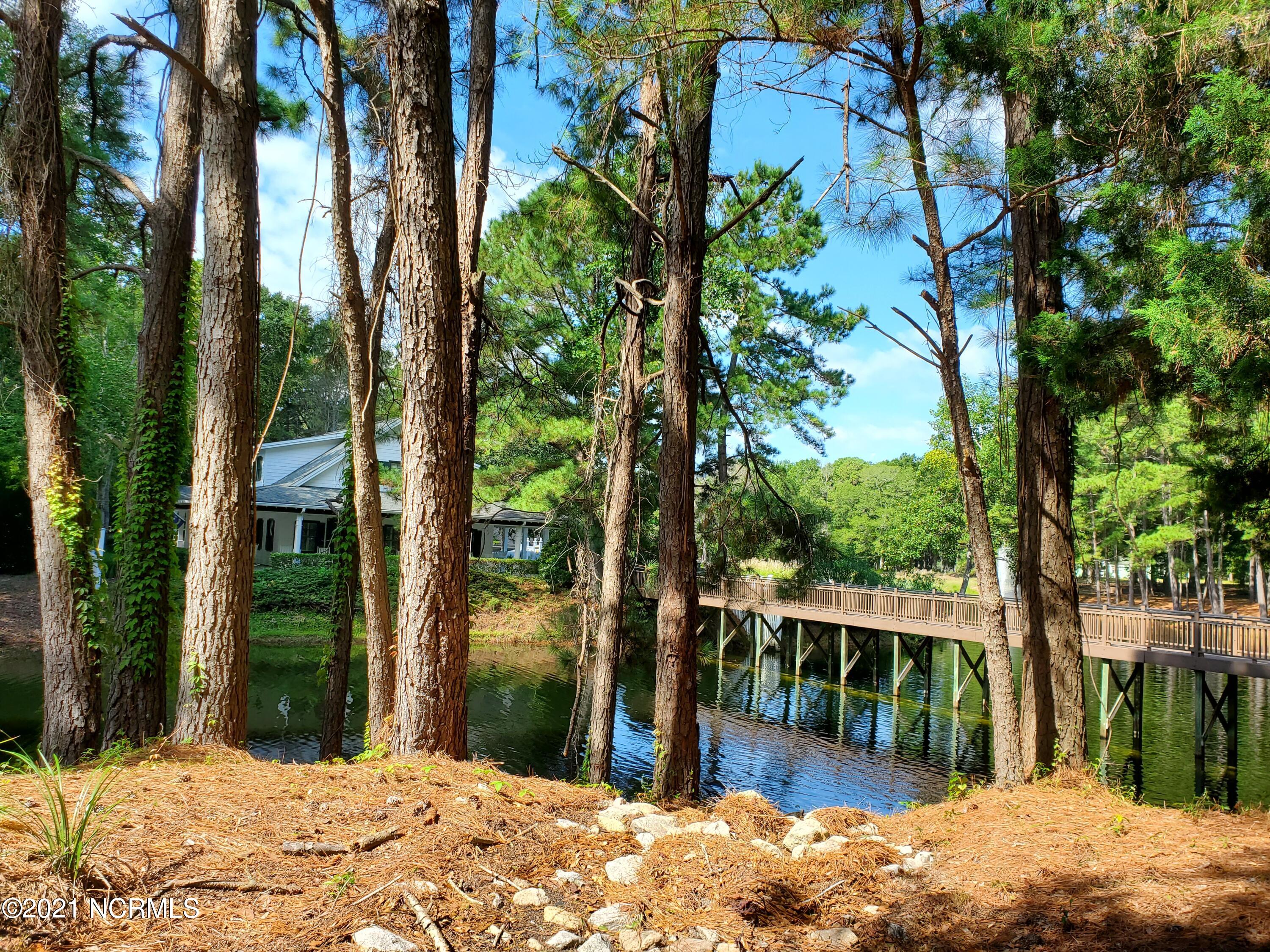 9148 East Bramshill Road Southwest Calabash, NC 28467 - Photo 5 of 10 Walkway to Clubhouse and Pool
