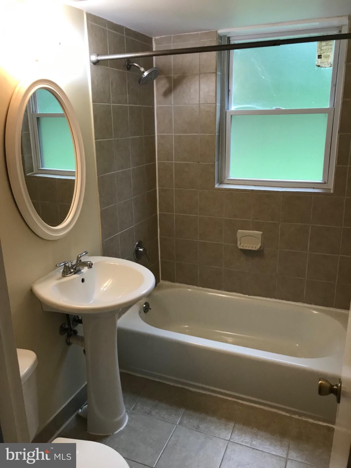 113 Kingsley Road Southwest Vienna, VA 22180 - Photo 23 of 40 Bright and inviting bathroom oasis.