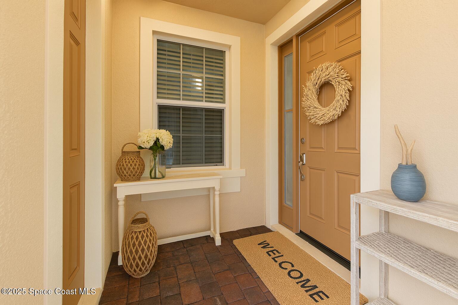 5779 Claiborne Street Melbourne, FL 32940 - Photo 3 of 15 a bathroom with a sink and a mirror