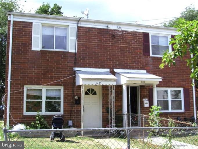 636 Four Mile Road Alexandria, VA 22305 - Photo 1 of 1 front view of a brick house with a yard
